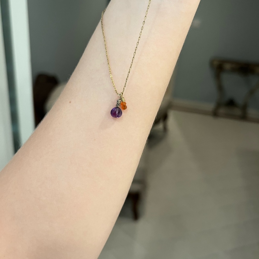 GOLD NECKLACE WITH CHARMS